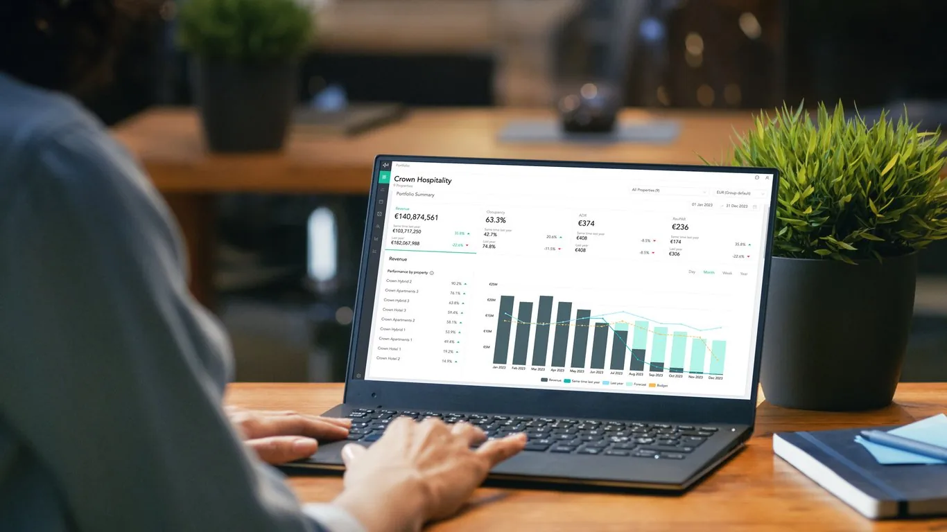Hospitality revenue manager reviewing performance data